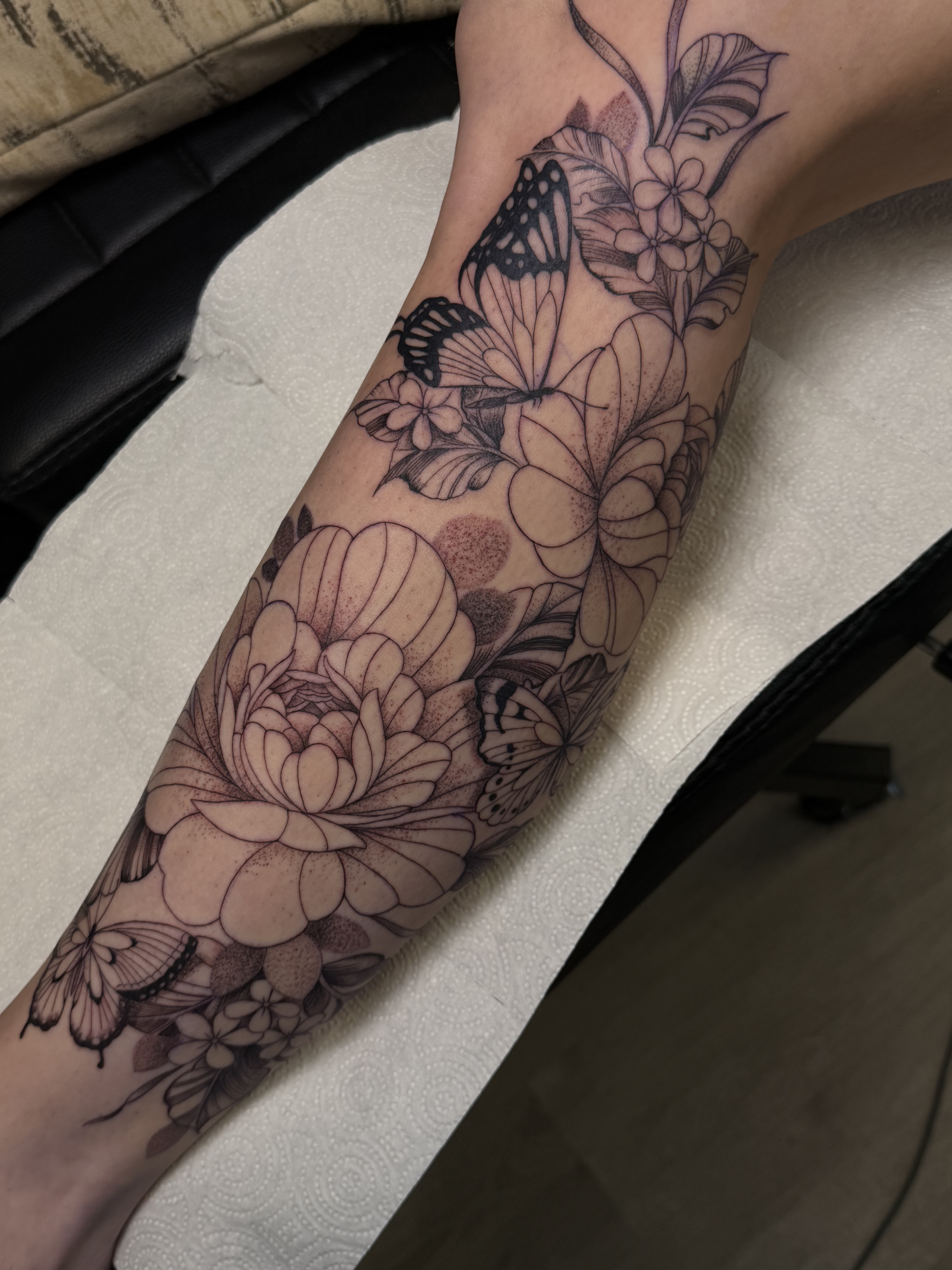 Floral and butterfly leg piece